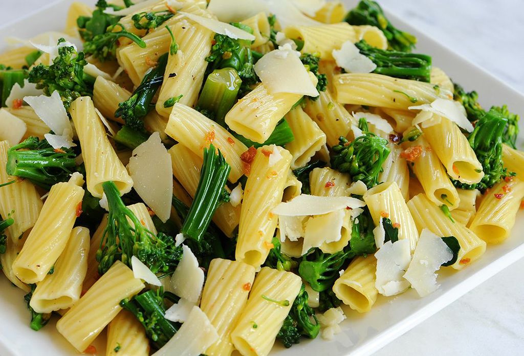 rigatoni-pasta-with-broccolini-tossed-with-roasted-garlic-and-red-chili-pepper-oil-topped-with-shaved-parmesan
