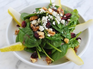spinach-salad-with-cranberries-candied-walnuts-pears-and-goat-cheese-tossed-with-raspberry-vinaigrette